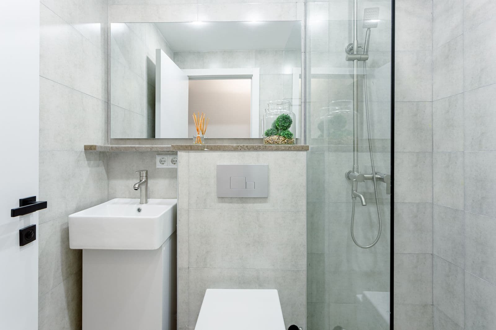 In-suite bathroom with glass shower